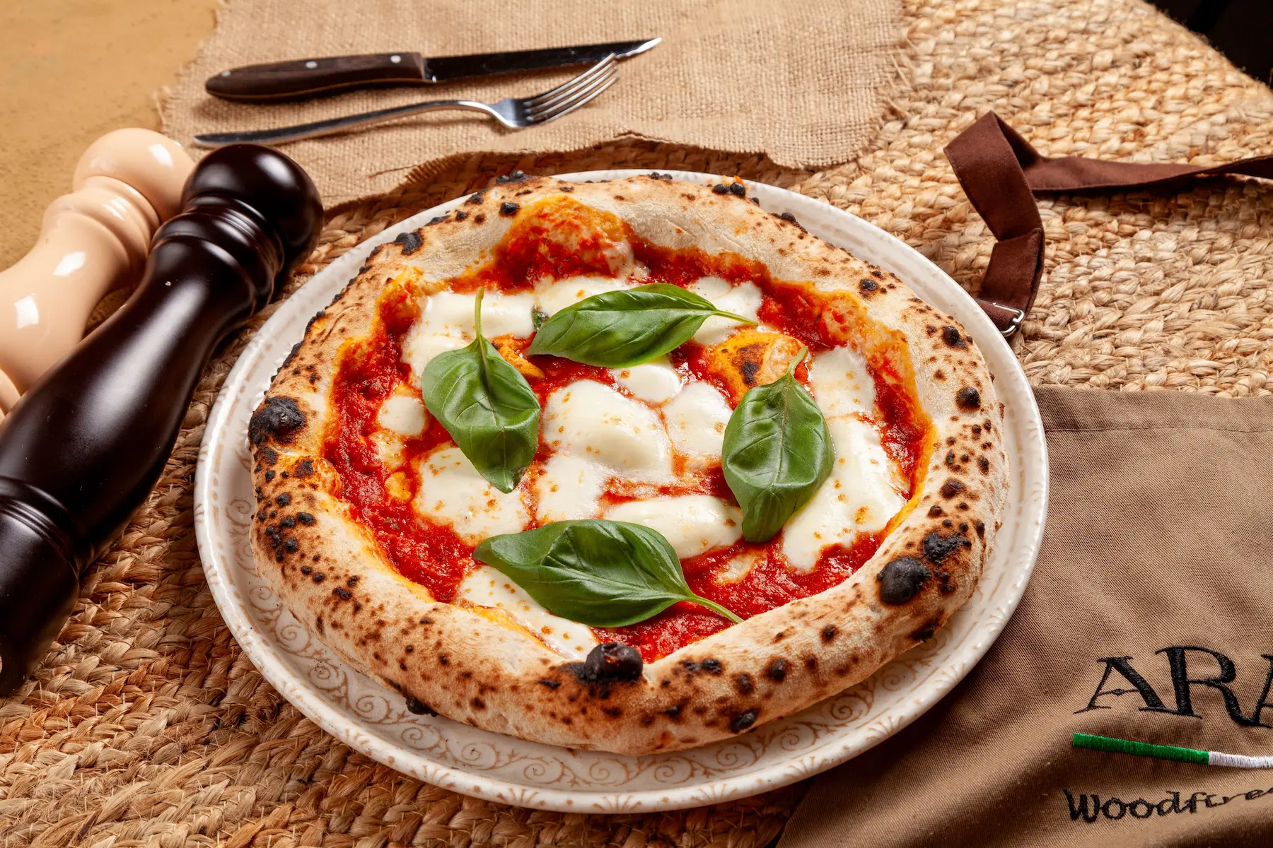 Italy travel guide close up of a Neapolitan margherita pizza in Naples