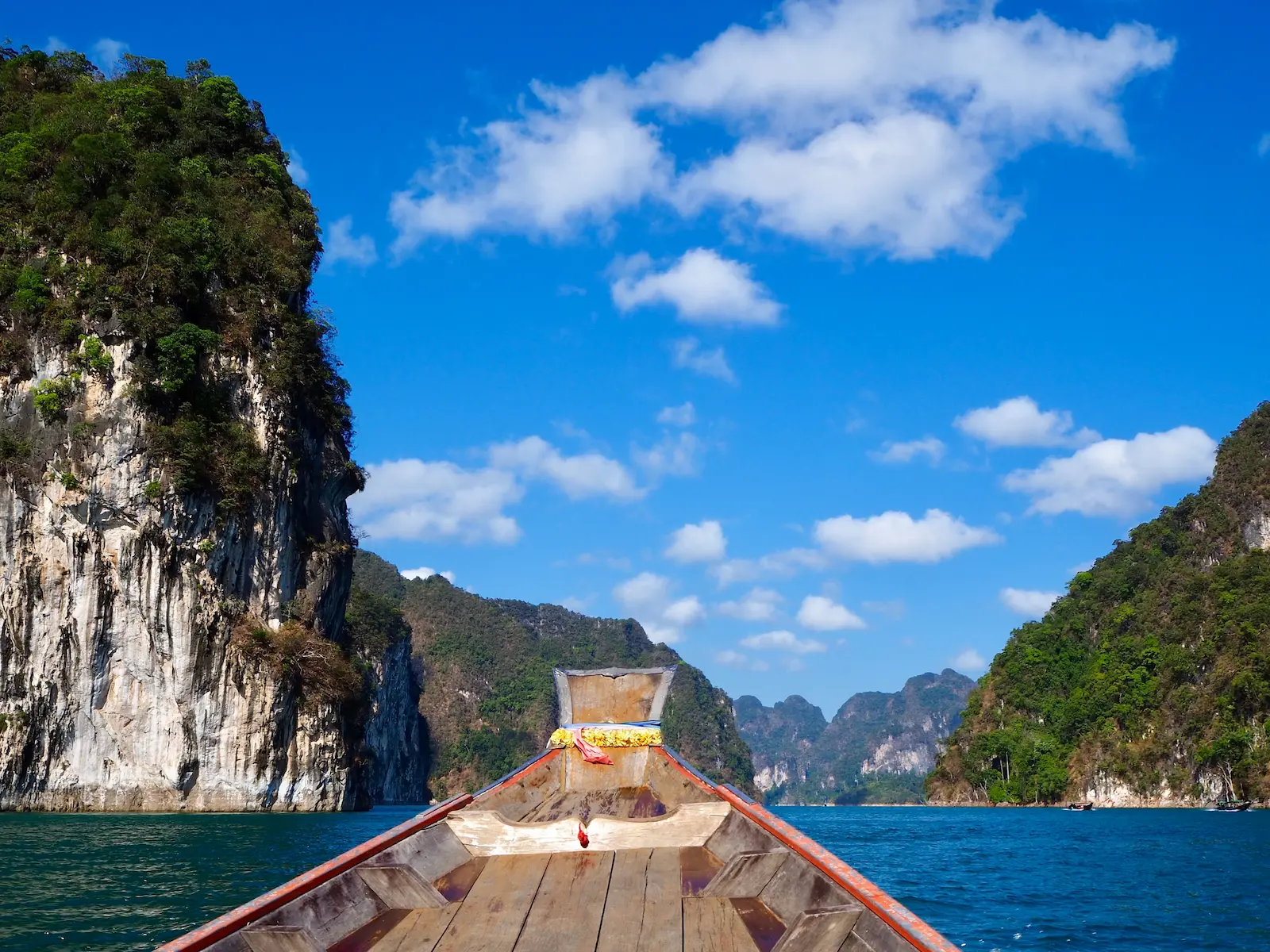 Things to do in Thailand: limestone cliffs over Cheow Lan Lake in Khao Sok
