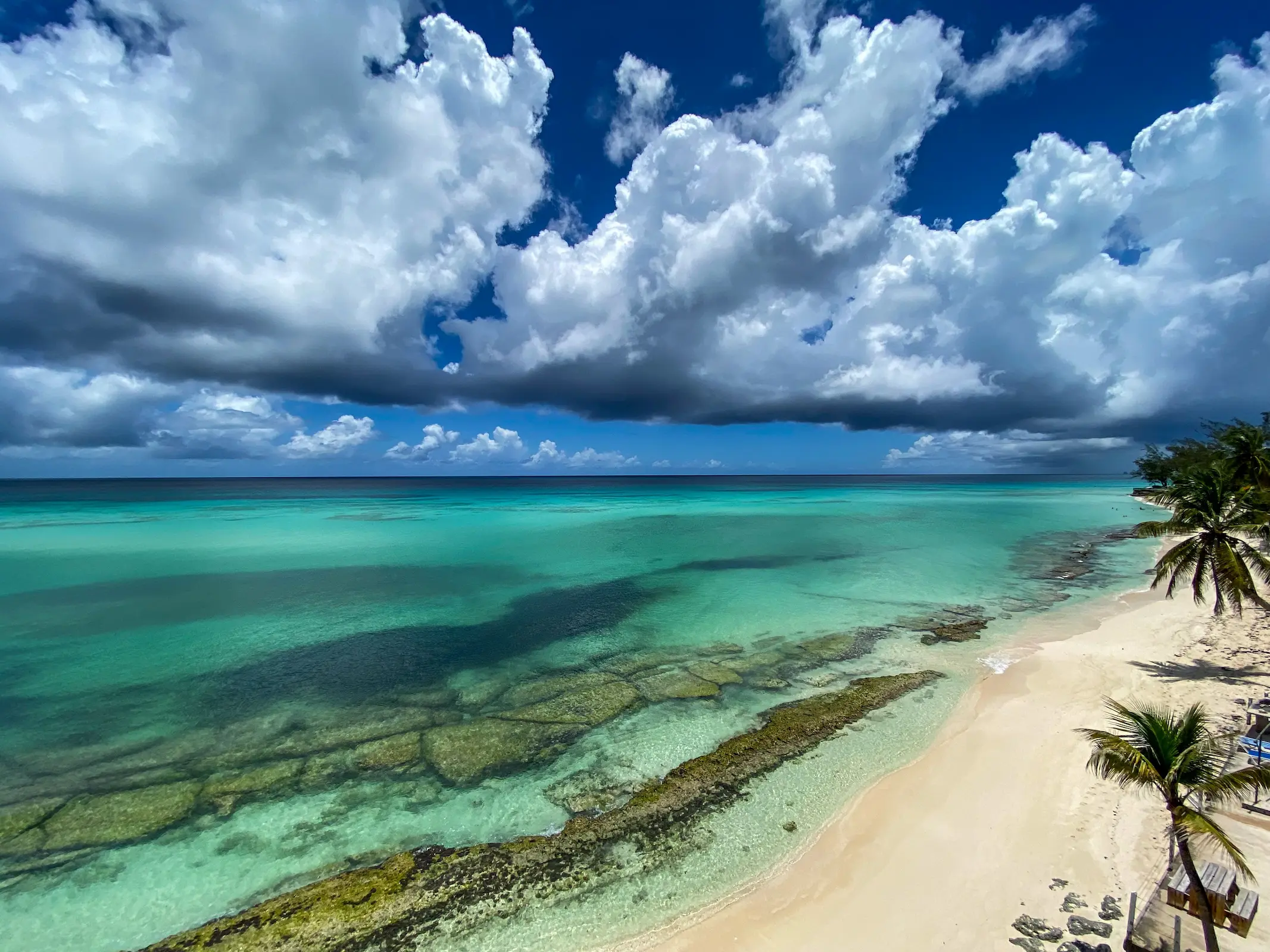 Turquoise water and white sand at Carlisle Bay, one of the top things to do in Barbados on a budget