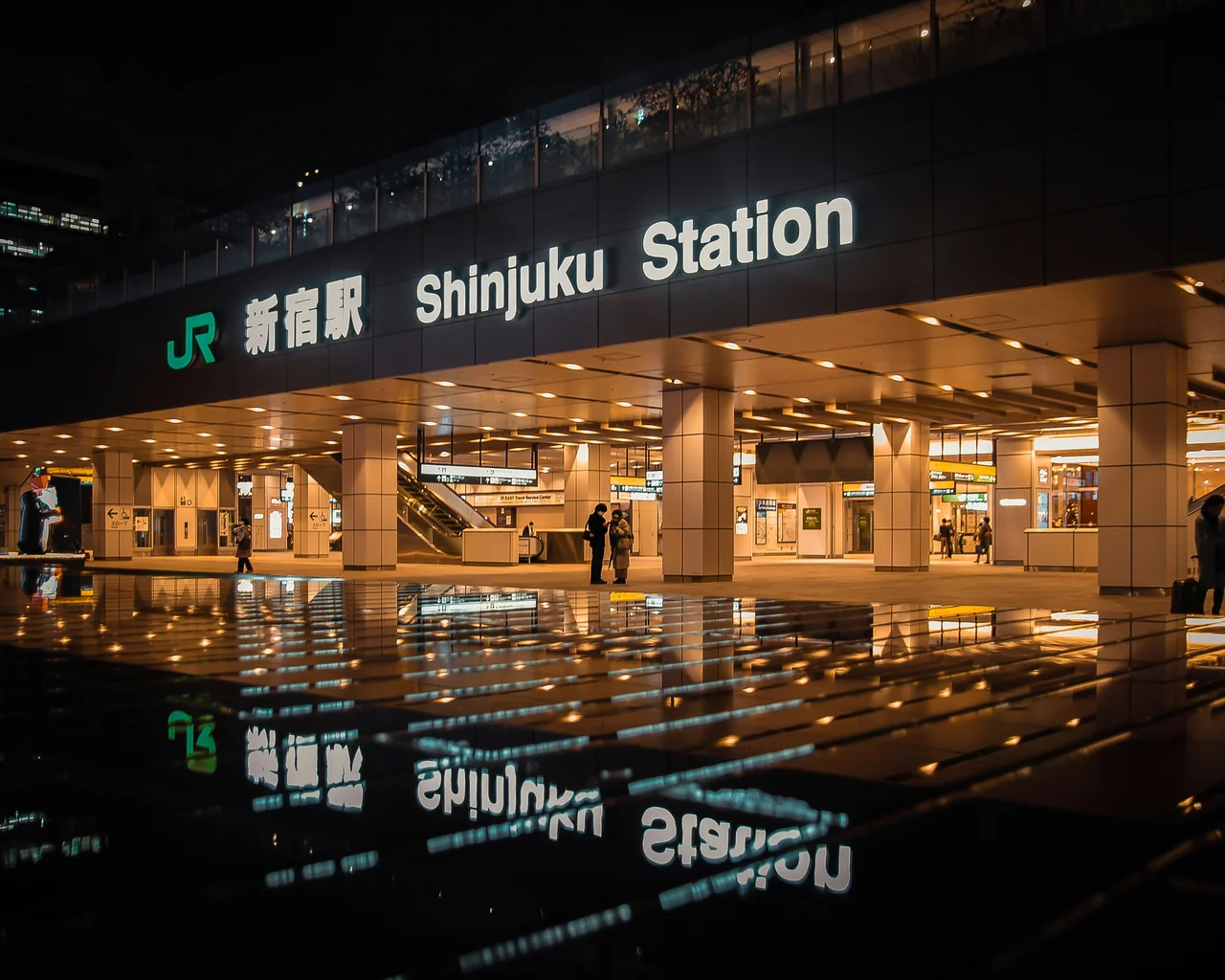 Japan travel guide shot of a Shinkansen bullet train at a station platform